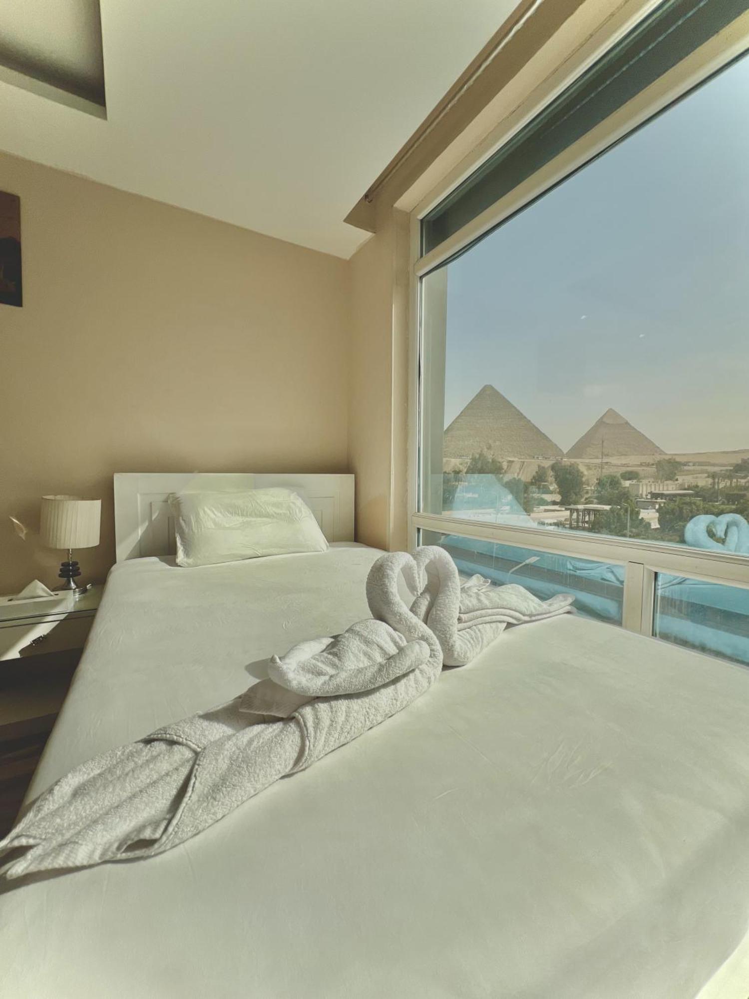 Turquoise Pyramids & Grand Egyptian Museum View Hotel Kafret el-Gabal エクステリア 写真