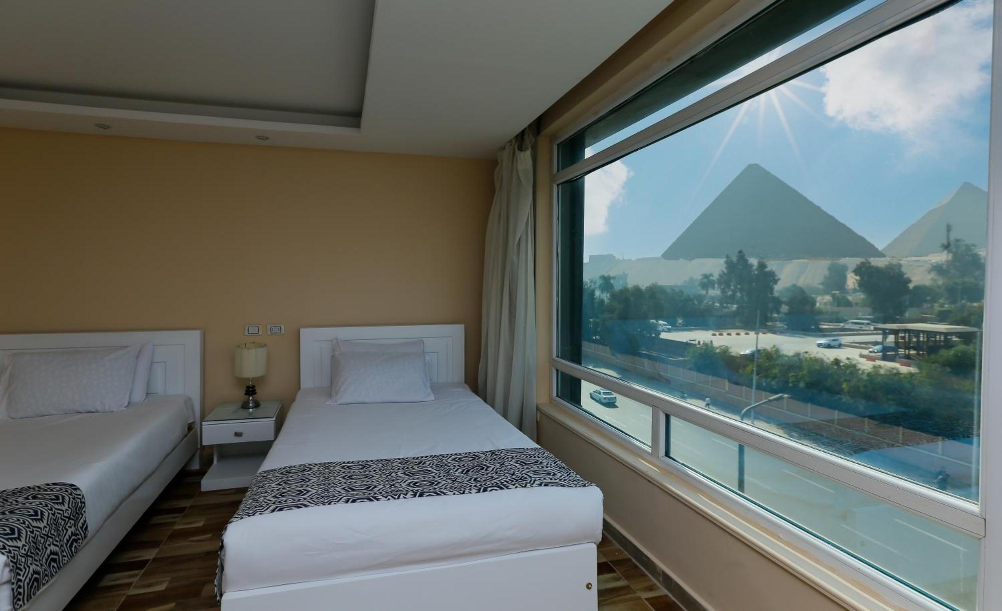 Turquoise Pyramids & Grand Egyptian Museum View Hotel Kafret el-Gabal エクステリア 写真
